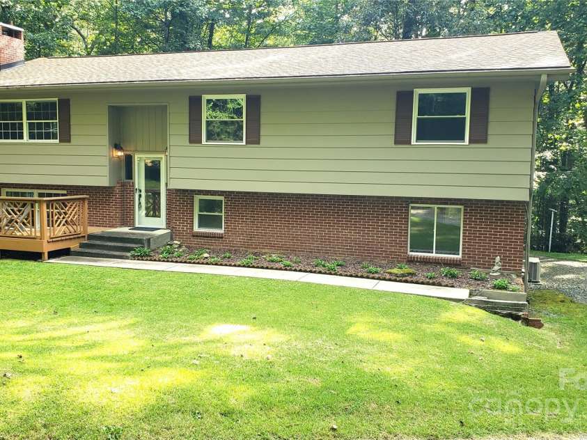 145 Jeter Mountain Road, Hendersonville, NC 28739.  MLS# CAR4281389, YatesRealty ID 94. Great location-Privacy & Convenience