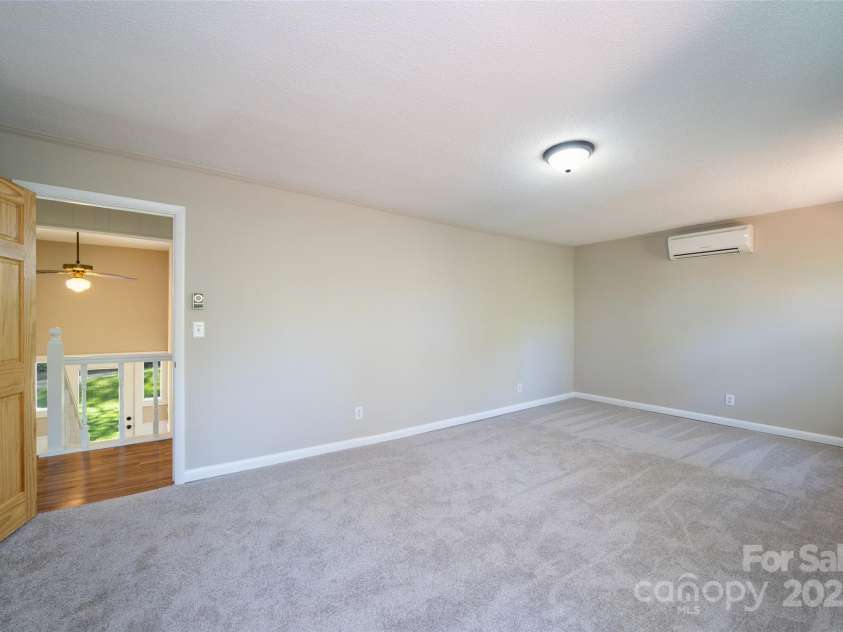 145 Jeter Mountain Road, Hendersonville, NC 28739.  MLS# CAR4281389, YatesRealty ID 94. Primary Bedroom