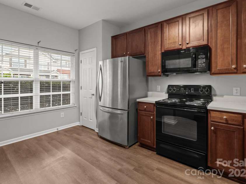 3553 Calpella Court, Charlotte, NC 28262.  MLS# CAR4220749, YatesRealty ID 9401. Kitchen overlooking front porch