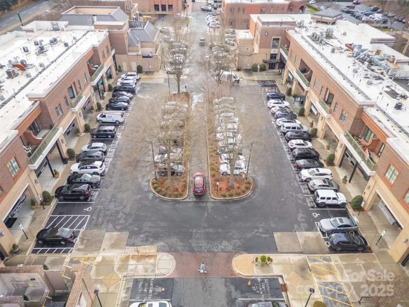 3920 Sharon Road, Charlotte, NC 28211.  MLS# CAR4225091, YatesRealty ID 9402. Parking with 1 designated spot to convey