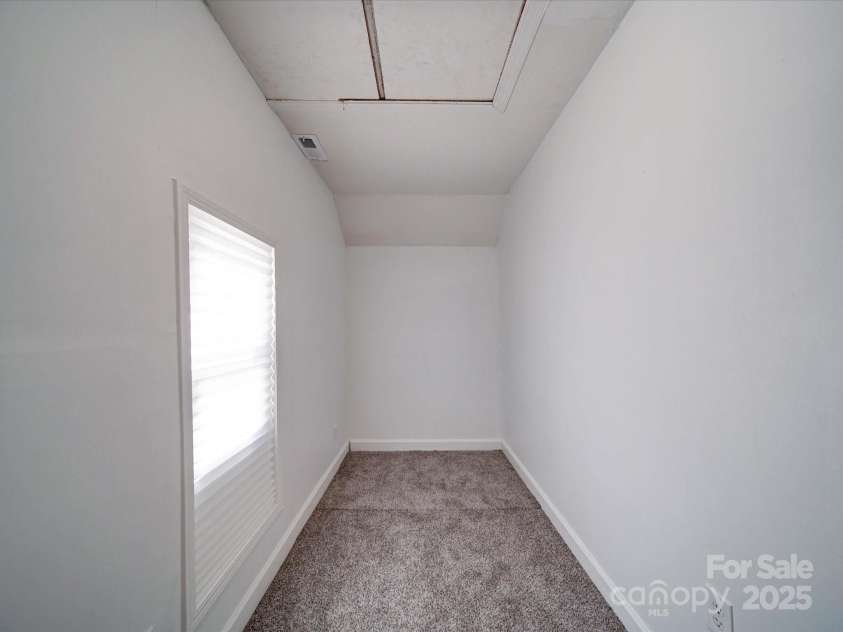 2300 Kennesaw Drive, Charlotte, NC 28216.  MLS# CAR4240575, YatesRealty ID 9406. Small bedroom off of living area