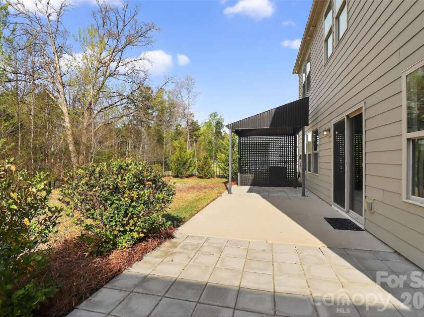 3851 Longmore Lane, Kannapolis, NC 28081.  MLS# CAR4359323, YatesRealty ID 9413. Extended patio with covered grill area