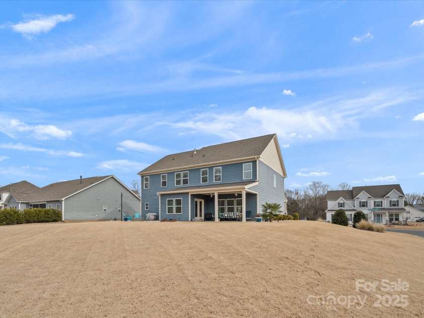 1503 Brooksland Place, Waxhaw, NC 28173.  MLS# CAR4213626, YatesRealty ID 9415. Rear elevation of the home