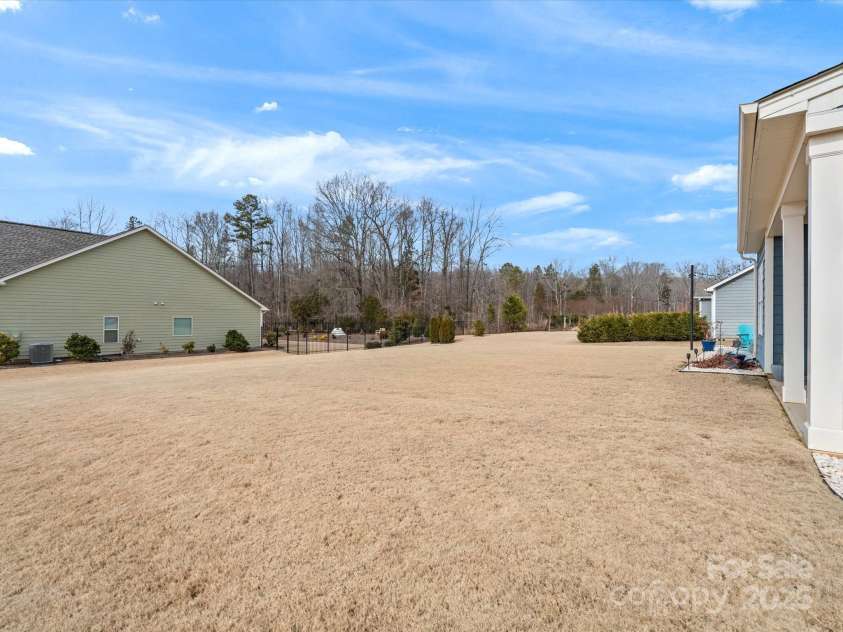 1503 Brooksland Place, Waxhaw, NC 28173.  MLS# CAR4213626, YatesRealty ID 9415. Rear yard