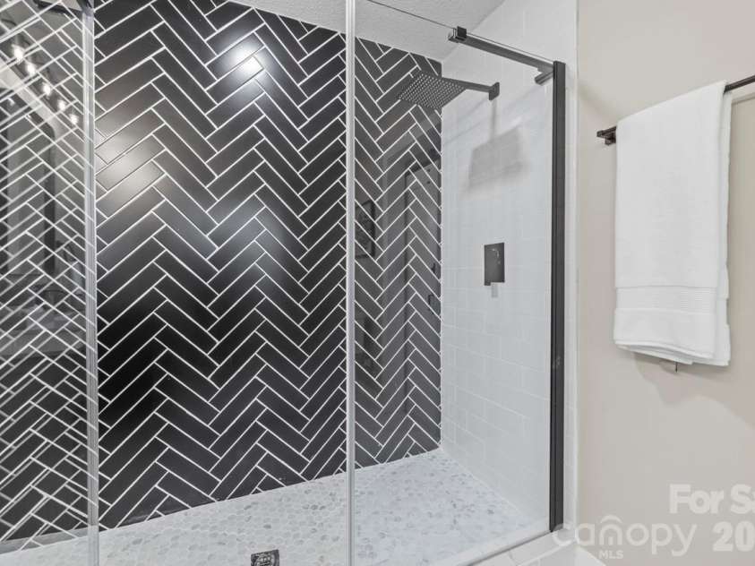 335 Eastcliff Drive, Concord, NC 28025.  MLS# CAR4366749, YatesRealty ID 9417. Primary bath shower