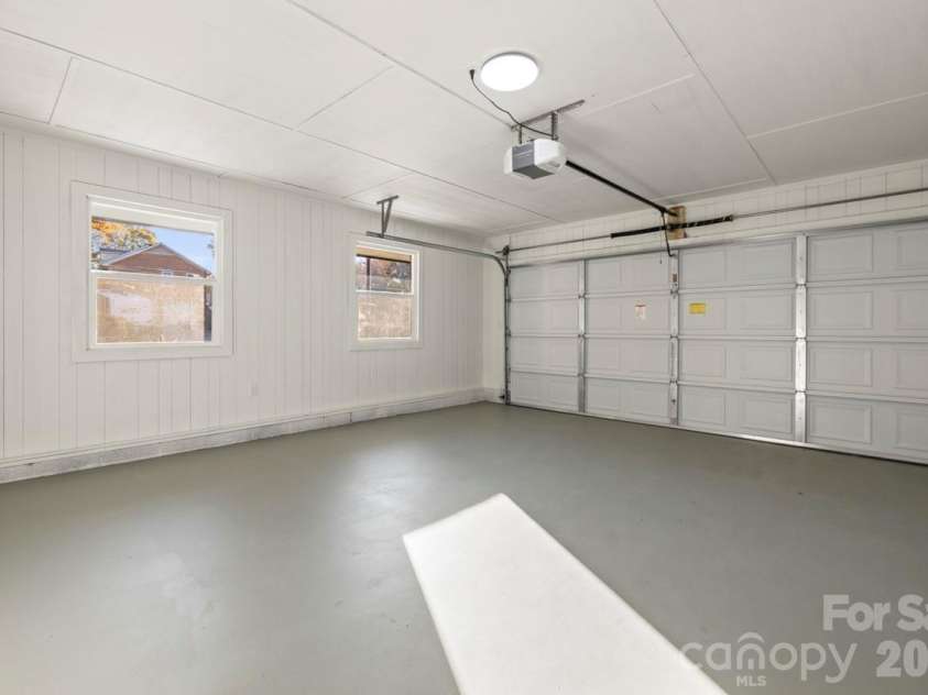 335 Eastcliff Drive, Concord, NC 28025.  MLS# CAR4366749, YatesRealty ID 9417. Two car garrage with storage room