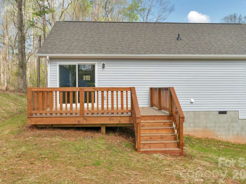 240 Parkland Drive, Forest City, NC 28043.  MLS# CAR4349686, YatesRealty ID 9418. Back deck