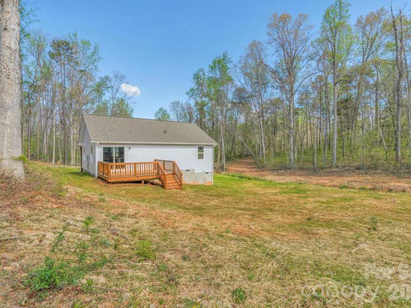 240 Parkland Drive, Forest City, NC 28043.  MLS# CAR4349686, YatesRealty ID 9418. Back yard & deck