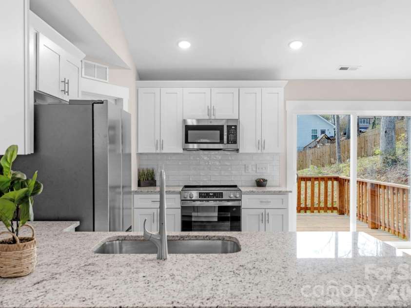 240 Parkland Drive, Forest City, NC 28043.  MLS# CAR4349686, YatesRealty ID 9418. Kitchen w/ granite