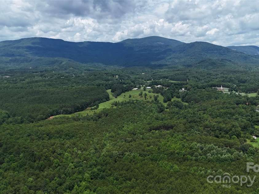 221 Flat Branch Trail, Mill Spring, NC 28756.  MLS# CAR4271037, YatesRealty ID 9427. 2nd Drone shot above this Home!