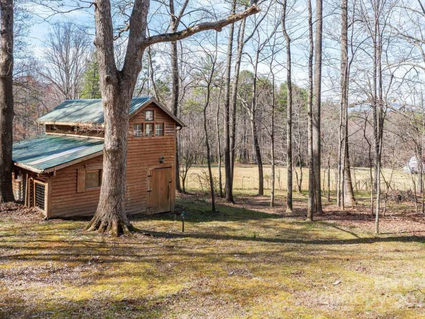 14 Woods Drive, Fairview, NC 28730.  MLS# CAR4223729, YatesRealty ID 9429. Barn with room above for the kids to play in.