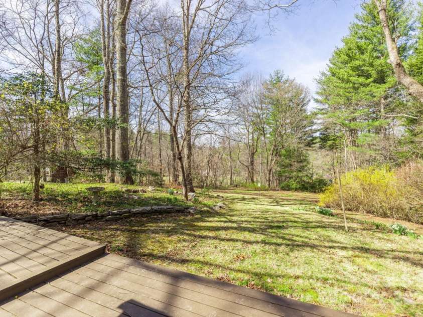 14 Woods Drive, Fairview, NC 28730.  MLS# CAR4223729, YatesRealty ID 9429. Front yard off of the deck.