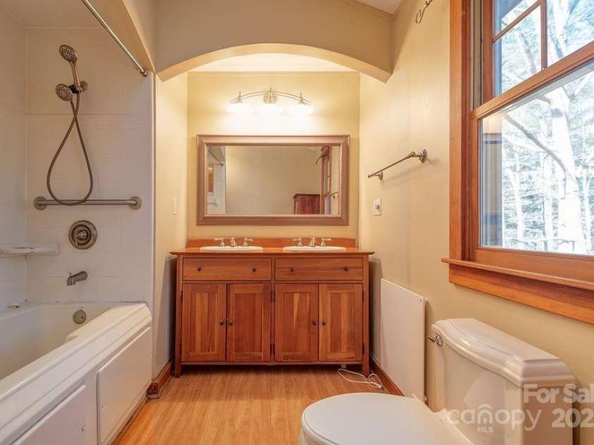 14 Woods Drive, Fairview, NC 28730.  MLS# CAR4223729, YatesRealty ID 9429. Full bathroom on upper level.