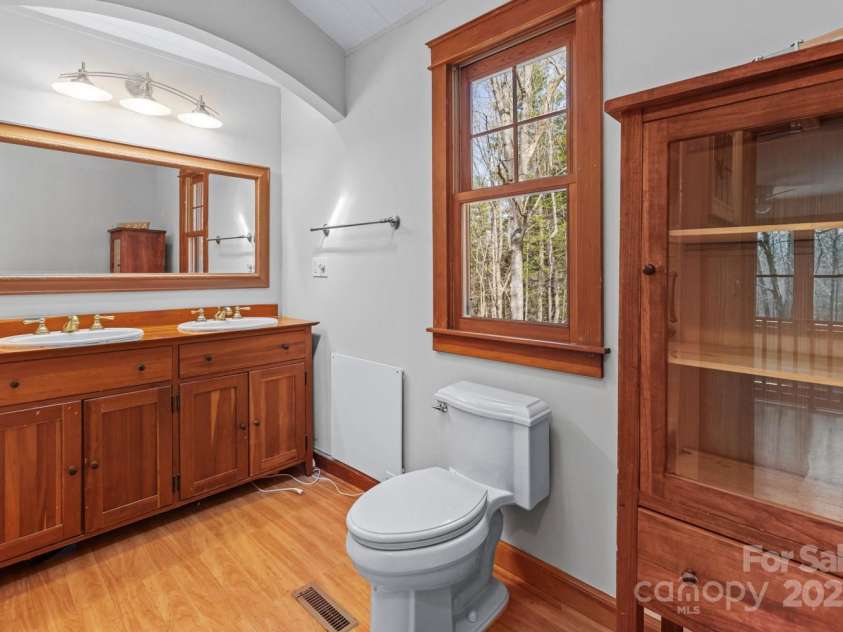 14 Woods Drive, Fairview, NC 28730.  MLS# CAR4223729, YatesRealty ID 9429. Full bathroom on upper level.