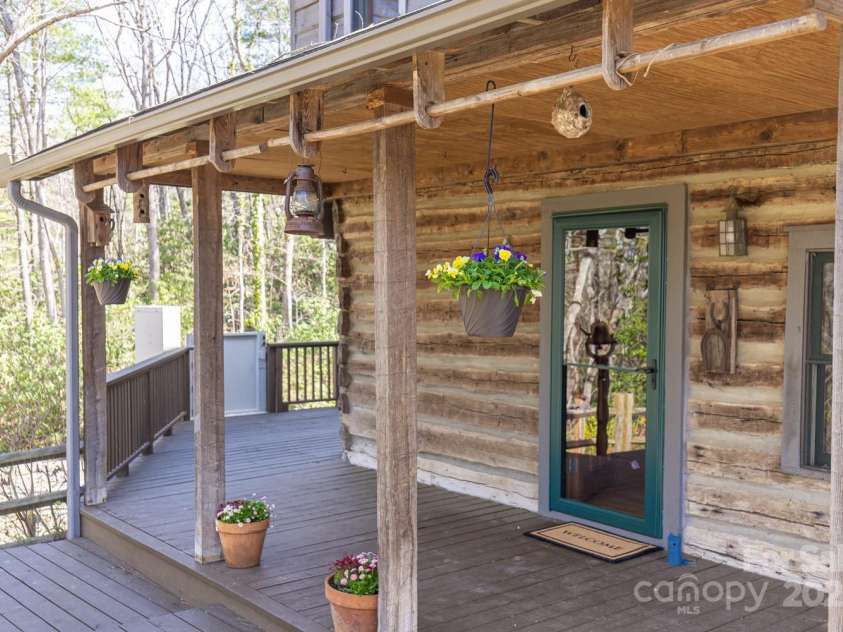 14 Woods Drive, Fairview, NC 28730.  MLS# CAR4223729, YatesRealty ID 9429. Over 1,500 sq ft of deck to enjoy.