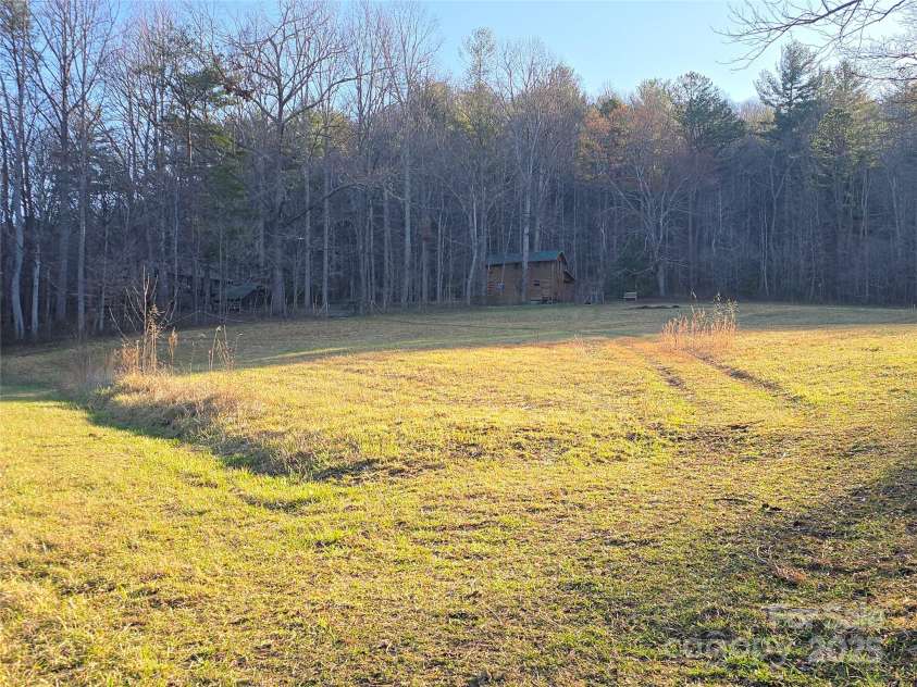 14 Woods Drive, Fairview, NC 28730.  MLS# CAR4223729, YatesRealty ID 9429. Pasture for your horses or farm animals.