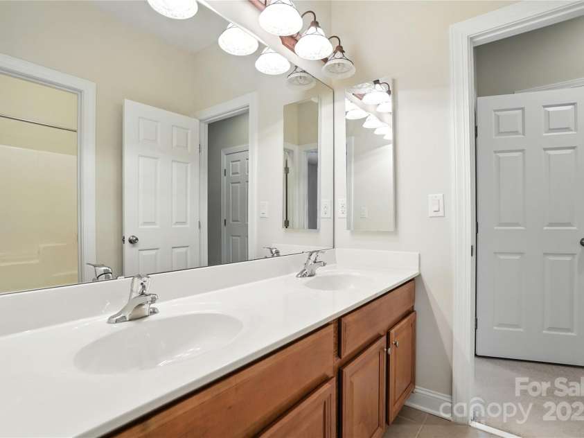 208 Woodwinds Drive, Mount Holly, NC 28120.  MLS# CAR4288550, YatesRealty ID 9433. 