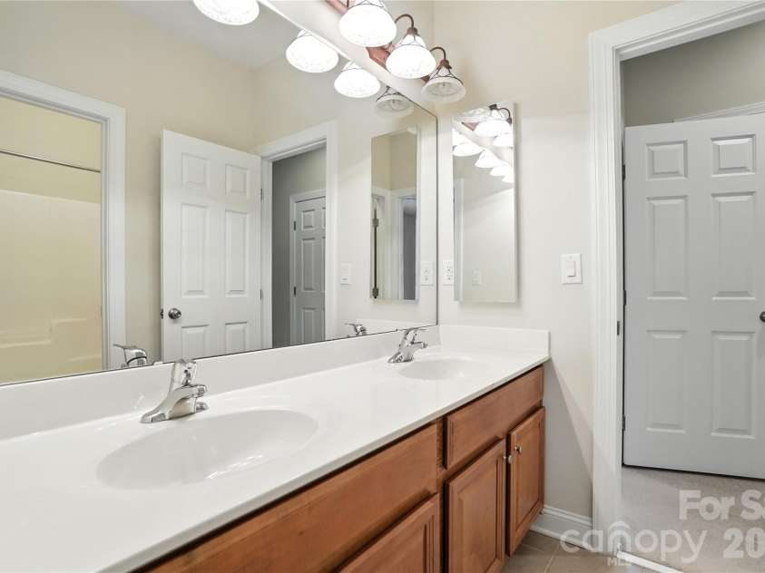 208 Woodwinds Drive, Mount Holly, NC 28120.  MLS# CAR4288550, YatesRealty ID 9433. 