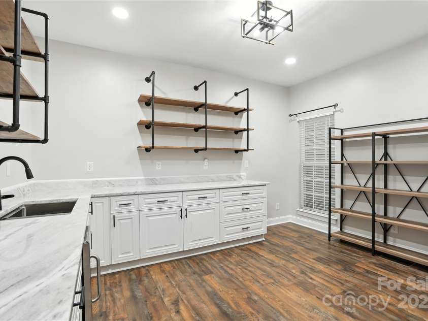 208 Woodwinds Drive, Mount Holly, NC 28120.  MLS# CAR4288550, YatesRealty ID 9433. Butler Pantry