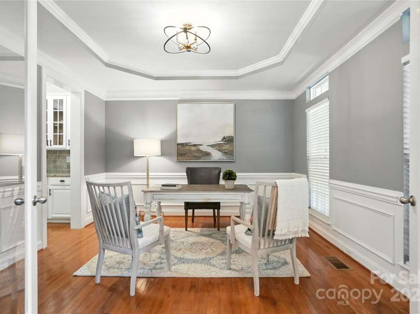 208 Woodwinds Drive, Mount Holly, NC 28120.  MLS# CAR4288550, YatesRealty ID 9433. Office space with hardwoods