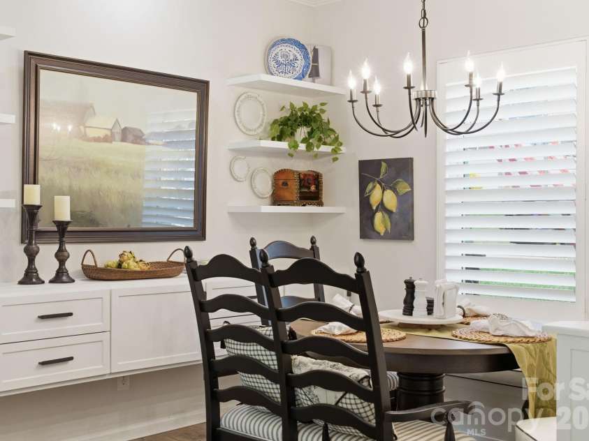 30132 Turtle Point Court, Lancaster, SC 29720.  MLS# CAR4360066, YatesRealty ID 9433. Dining area with built-in storage benches