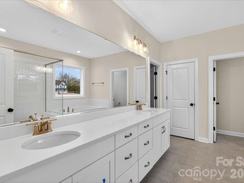 11020 Tyler Brook Lane, Mint Hill, NC 28227.  MLS# CAR4223643, YatesRealty ID 9434. Premier Bath