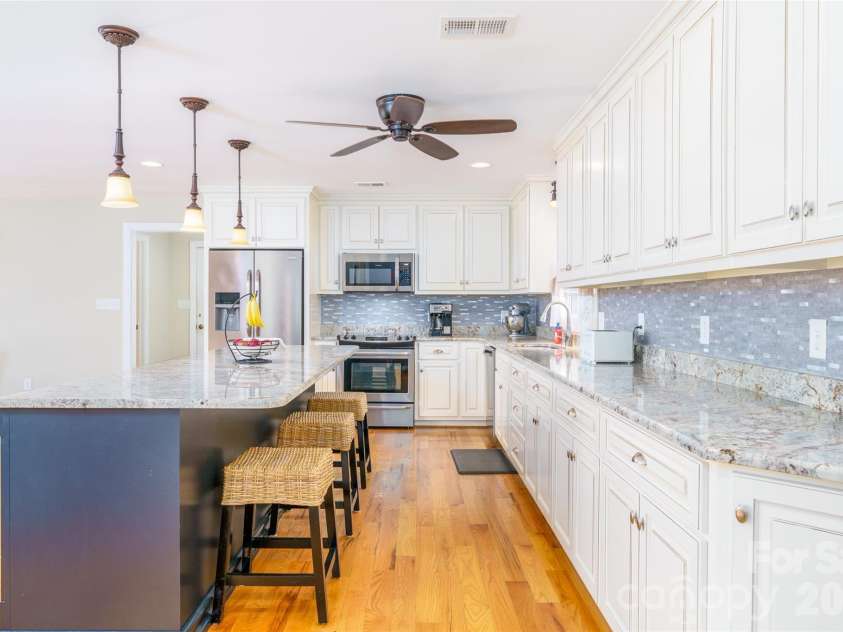 8194 Mallard Road, Denver, NC 28037.  MLS# CAR4337437, YatesRealty ID 9434. Kitchen With Breakfast Bar and Island