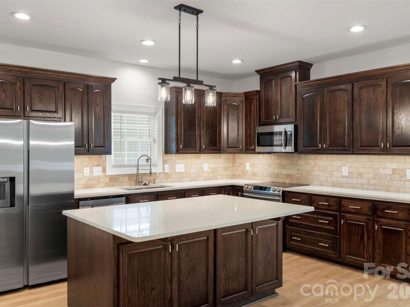 206 Montclair Drive, Locust, NC 28097.  MLS# CAR4305500, YatesRealty ID 9436. 