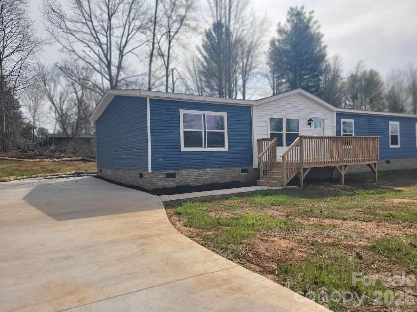 4142 Alderbrook Court, Lenoir, NC 28645.  MLS# CAR4359545, YatesRealty ID 9447. FRONT ELEVATION w/CONCRETE PAVED DRIVE