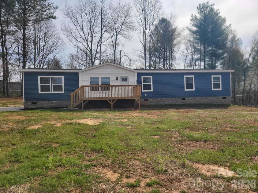 4142 Alderbrook Court, Lenoir, NC 28645.  MLS# CAR4359545, YatesRealty ID 9447. FRONT ELEVATION W/LARGE FRONT DECK