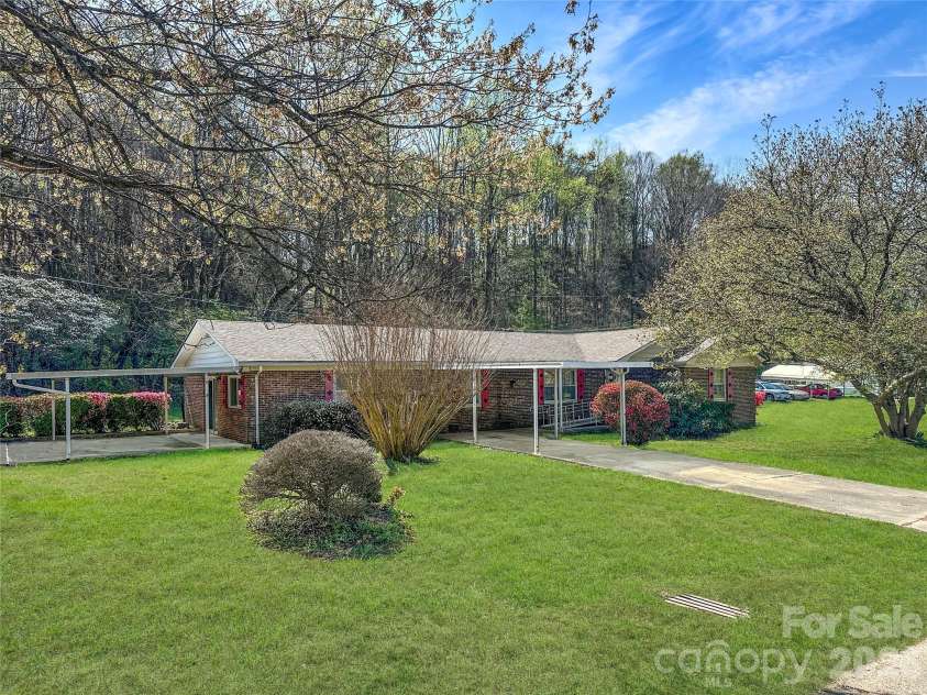 205 Bond Street, Marion, NC 28752.  MLS# CAR4366015, YatesRealty ID 9452. Grass Virtually Enhanced