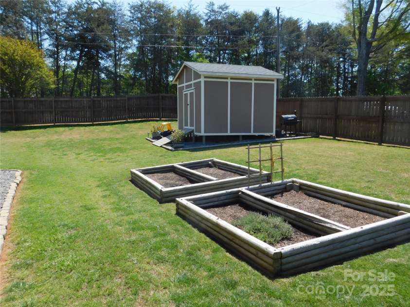 101 Brookview Drive, Shelby, NC 28152.  MLS# CAR4231823, YatesRealty ID 9454. Raised Beds and Shed