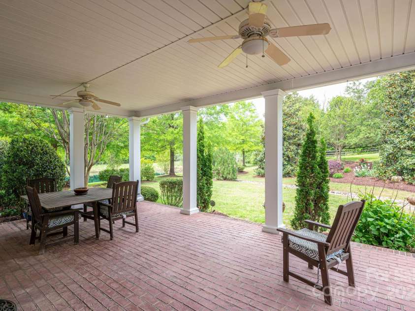 7701 Gold Hill Road, Rockwell, NC 28138.  MLS# CAR4246769, YatesRealty ID 9456. Huge back covered porch.