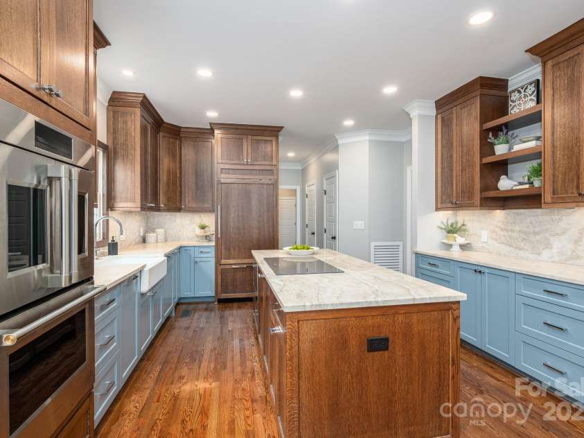 7701 Gold Hill Road, Rockwell, NC 28138.  MLS# CAR4246769, YatesRealty ID 9456. Paneled Sub-Zero refrigerator.