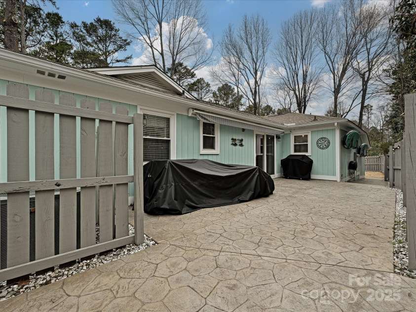 5091 Windward Drive, Tega Cay, SC 29708.  MLS# CAR4231303, YatesRealty ID 9459. Back Patio