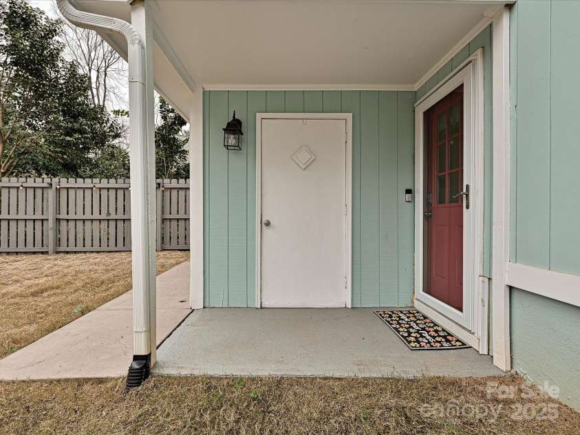 5091 Windward Drive, Tega Cay, SC 29708.  MLS# CAR4231303, YatesRealty ID 9459. Exterior storage closet with outlets