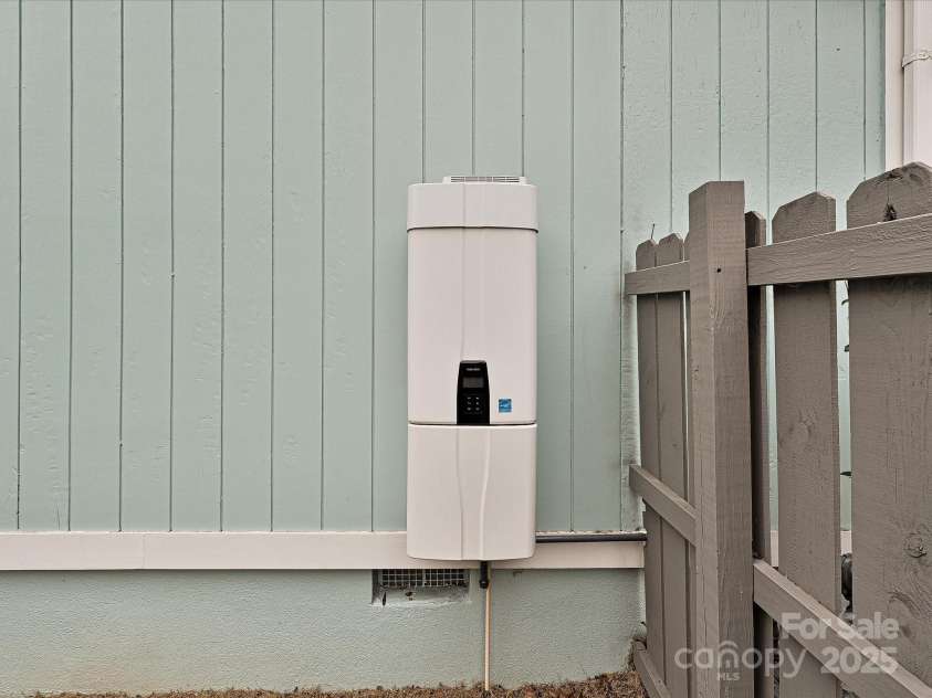 5091 Windward Drive, Tega Cay, SC 29708.  MLS# CAR4231303, YatesRealty ID 9459. Tankless water heater