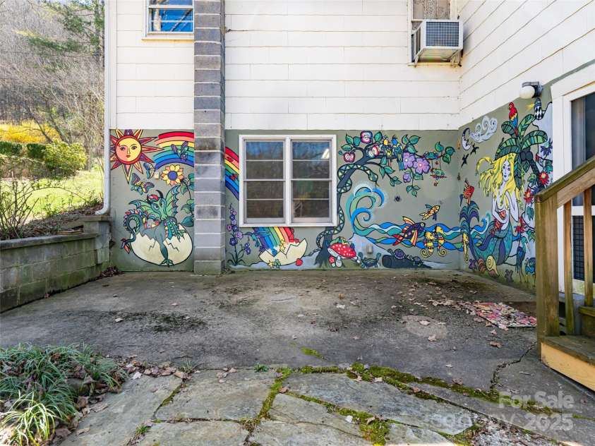 170 Pleasant Valley Road, Burnsville, NC 28714.  MLS# CAR4121722, YatesRealty ID 9462. Back patio