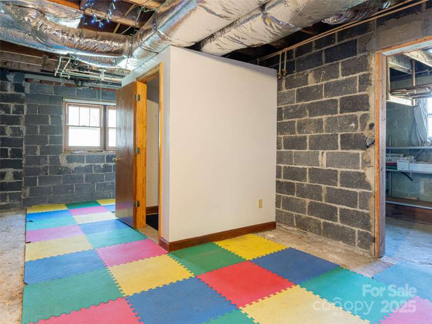 170 Pleasant Valley Road, Burnsville, NC 28714.  MLS# CAR4121722, YatesRealty ID 9462. Half bath in basement