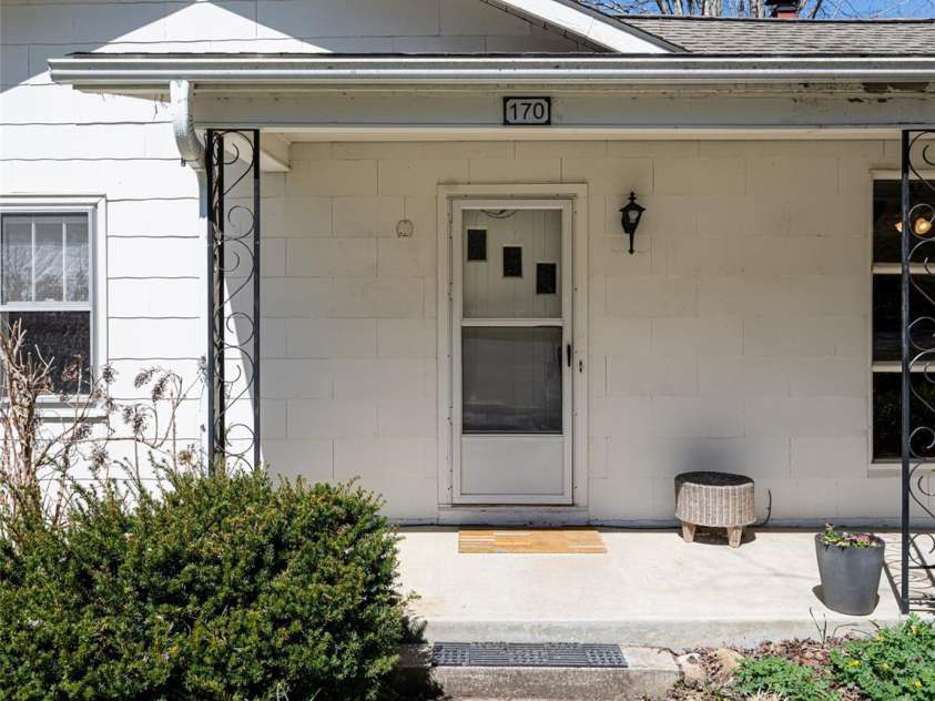 170 Pleasant Valley Road, Burnsville, NC 28714.  MLS# CAR4121722, YatesRealty ID 9462. Inviting front porch