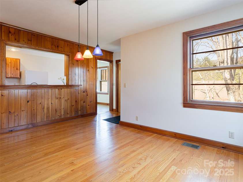 170 Pleasant Valley Road, Burnsville, NC 28714.  MLS# CAR4121722, YatesRealty ID 9462. Kitchen open to dining area