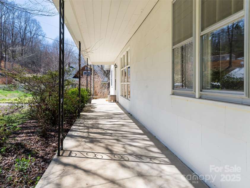 170 Pleasant Valley Road, Burnsville, NC 28714.  MLS# CAR4121722, YatesRealty ID 9462. Relax and unwind on the covered front porch