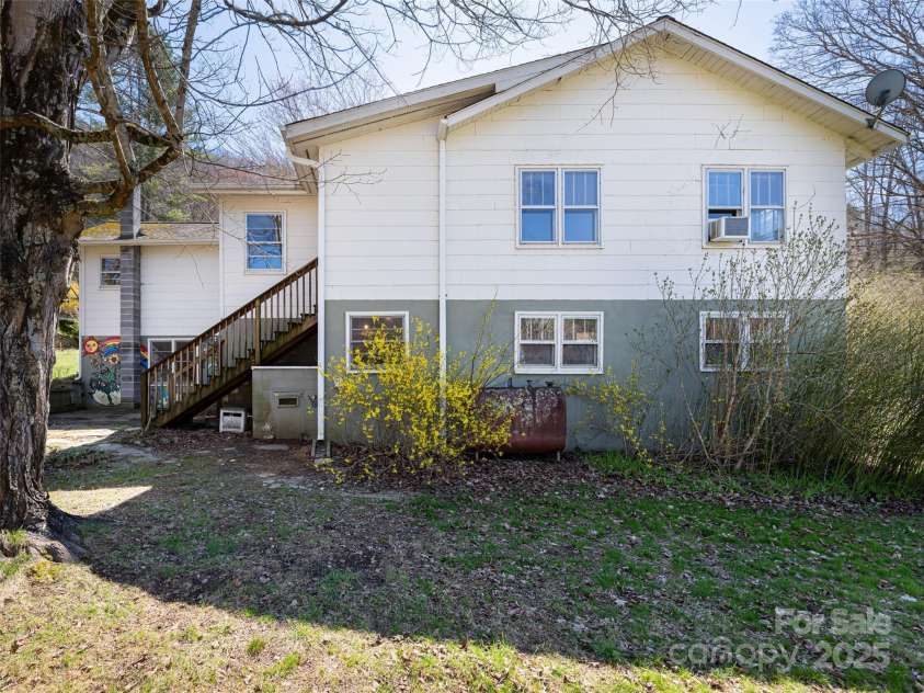 170 Pleasant Valley Road, Burnsville, NC 28714.  MLS# CAR4121722, YatesRealty ID 9462. Side view