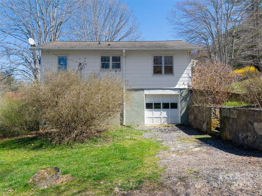 170 Pleasant Valley Road, Burnsville, NC 28714.  MLS# CAR4121722, YatesRealty ID 9462. Single garage in basement