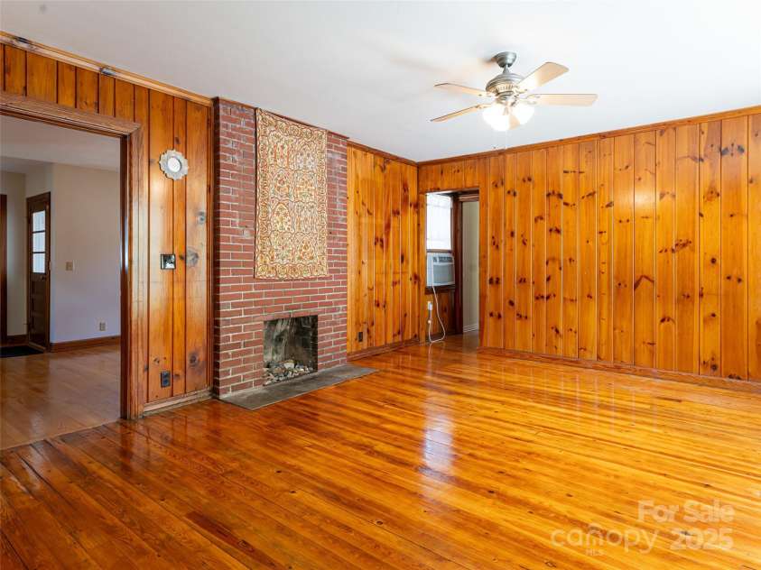 170 Pleasant Valley Road, Burnsville, NC 28714.  MLS# CAR4121722, YatesRealty ID 9462. White pine paneling