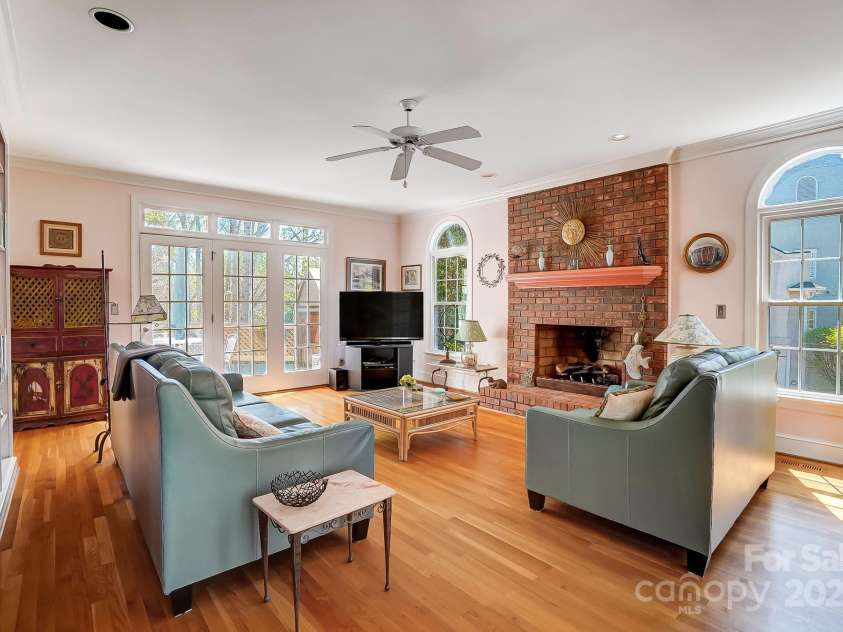 3717 Bodenham Court, Charlotte, NC 28215.  MLS# CAR4240203, YatesRealty ID 9464. Great room with fireplace.