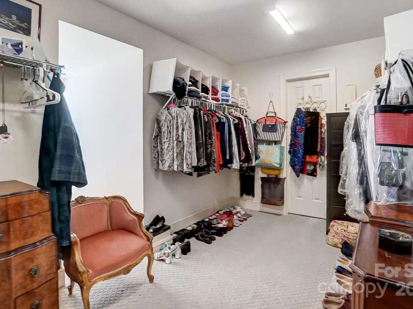 3717 Bodenham Court, Charlotte, NC 28215.  MLS# CAR4240203, YatesRealty ID 9464. Primary walk-in closet that connects to another closet area or craft room.
