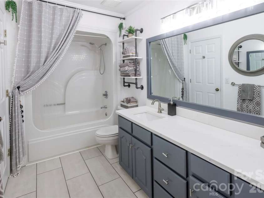 601 Azalea Lane, China Grove, NC 28023.  MLS# CAR4353505, YatesRealty ID 9473. Full bath with quartz counters