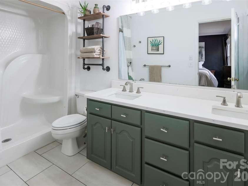 601 Azalea Lane, China Grove, NC 28023.  MLS# CAR4353505, YatesRealty ID 9473. Full bath with quartz counters