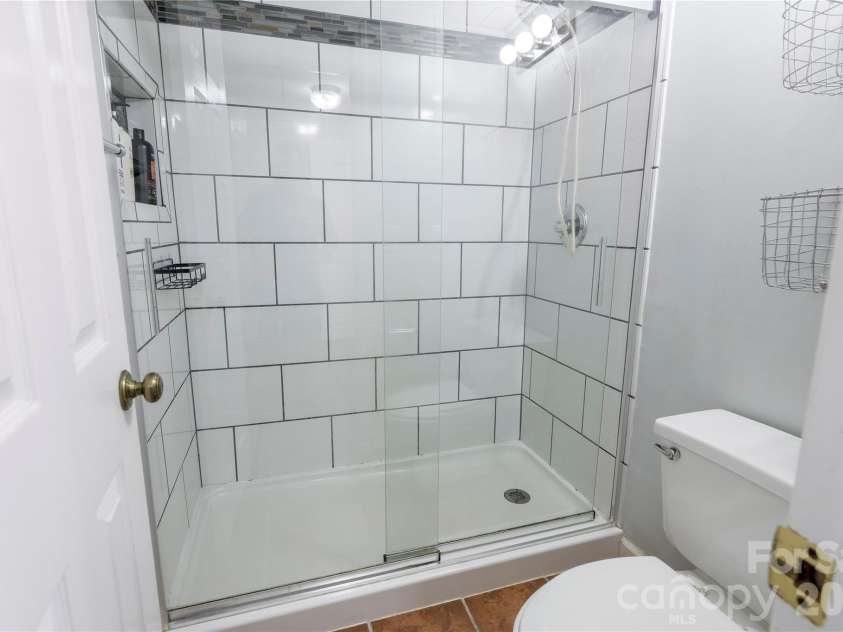 601 Azalea Lane, China Grove, NC 28023.  MLS# CAR4353505, YatesRealty ID 9473. Full bath with tile